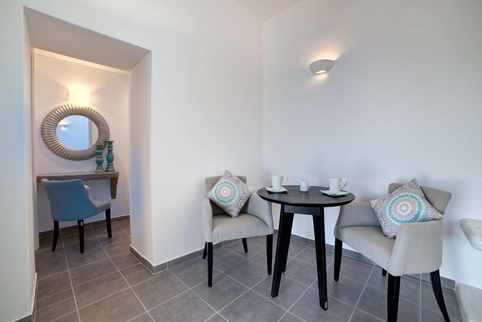 Remvi Suites Фиростефани Номер фото